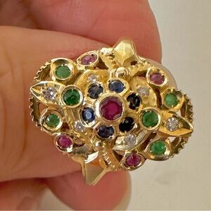 18k Gold sz 8 ring, 5 rubies, 6 emeralds, 6 sapphires, and 6 diamonds. 5.1G